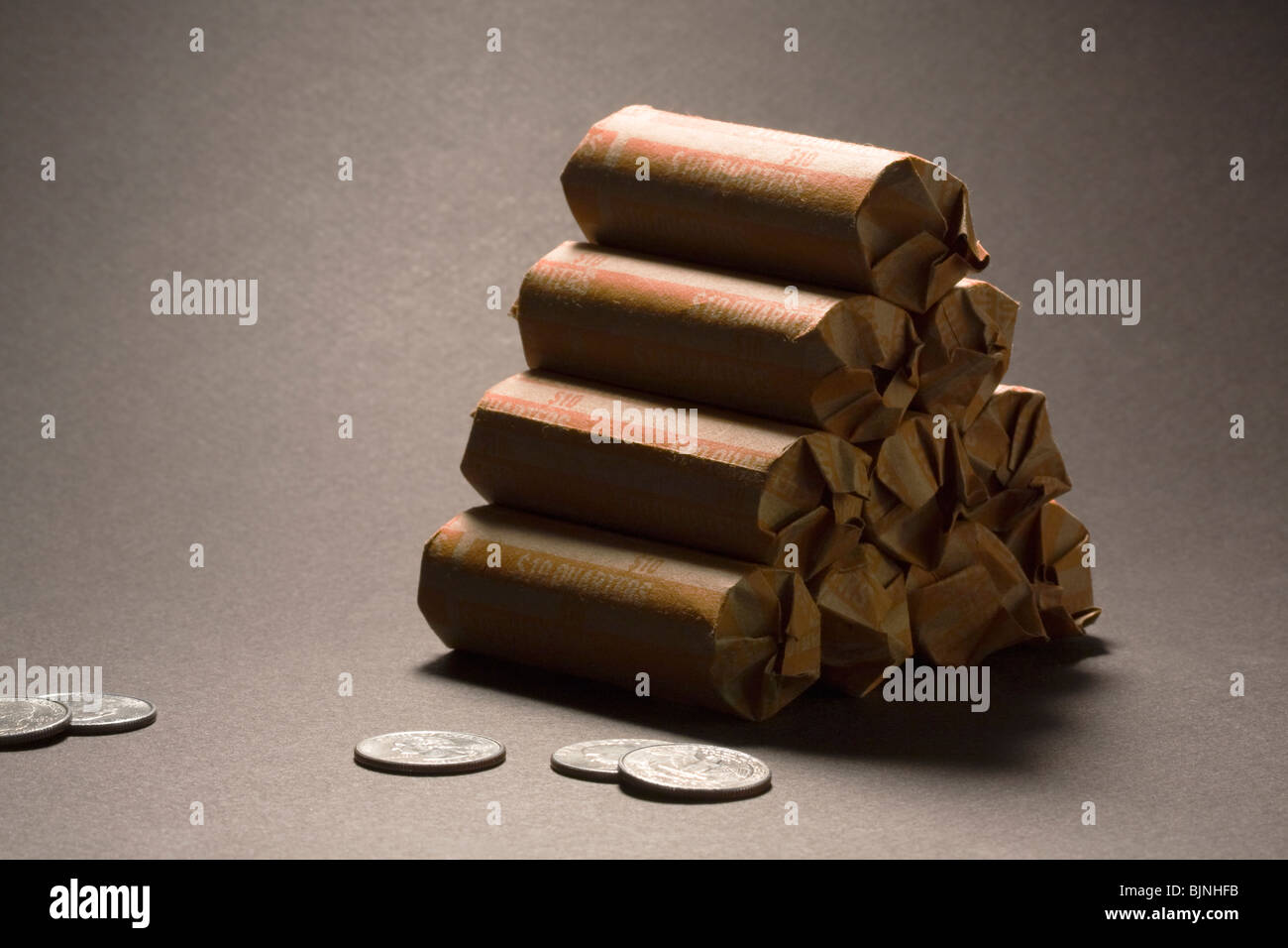 US Coins $100 in Quarters on Black Background Stock Photo