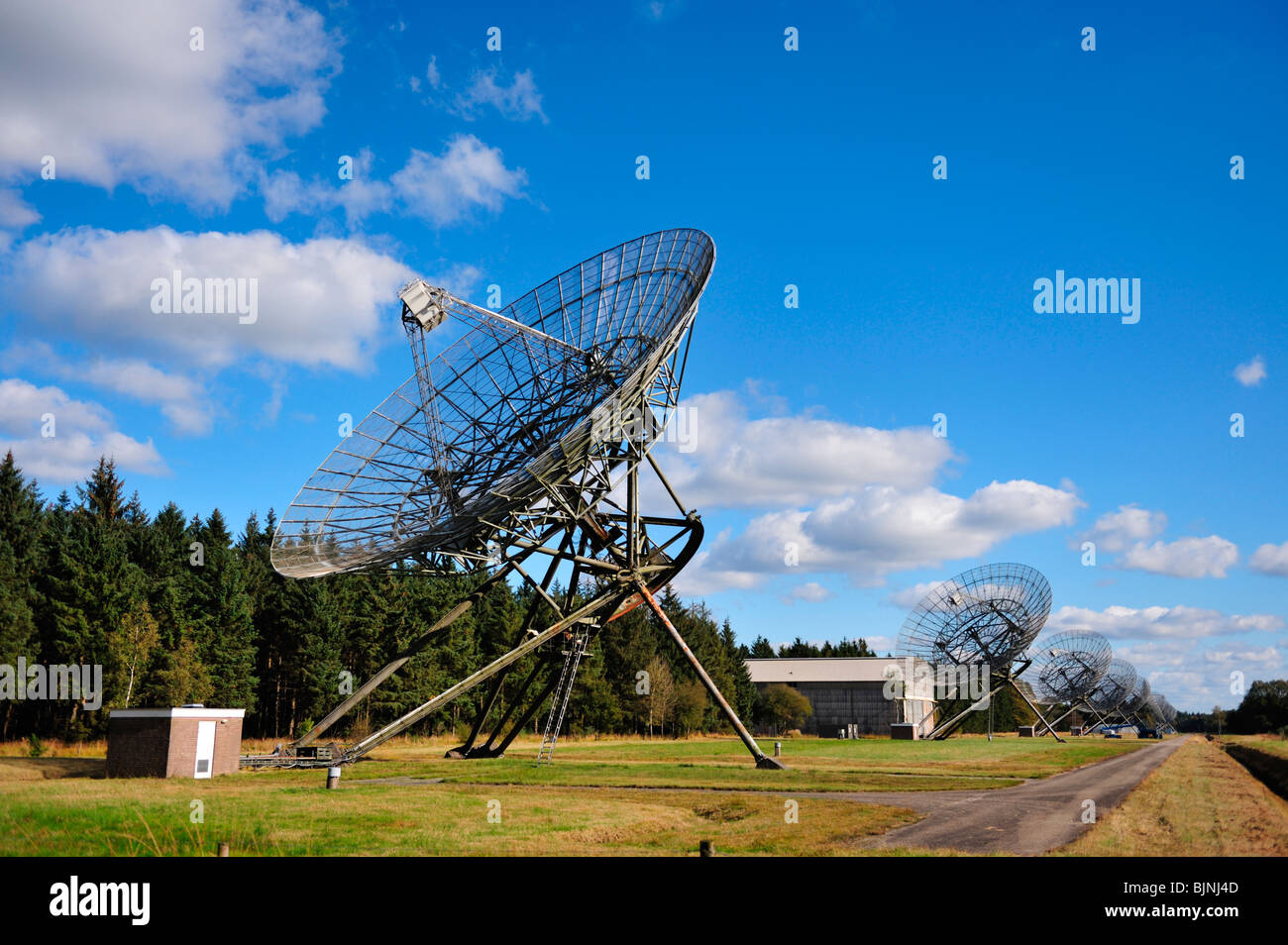 parabolic radio antenna s of the Westerbork Radio telescope in the Netherlands Stock Photo