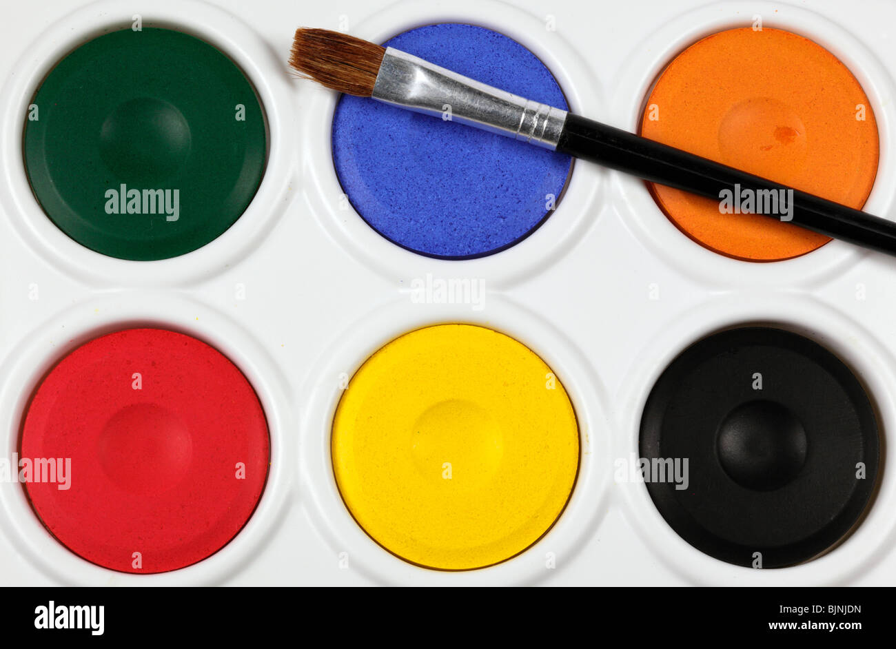 close up of a children's watercolour paint palette Stock Photo