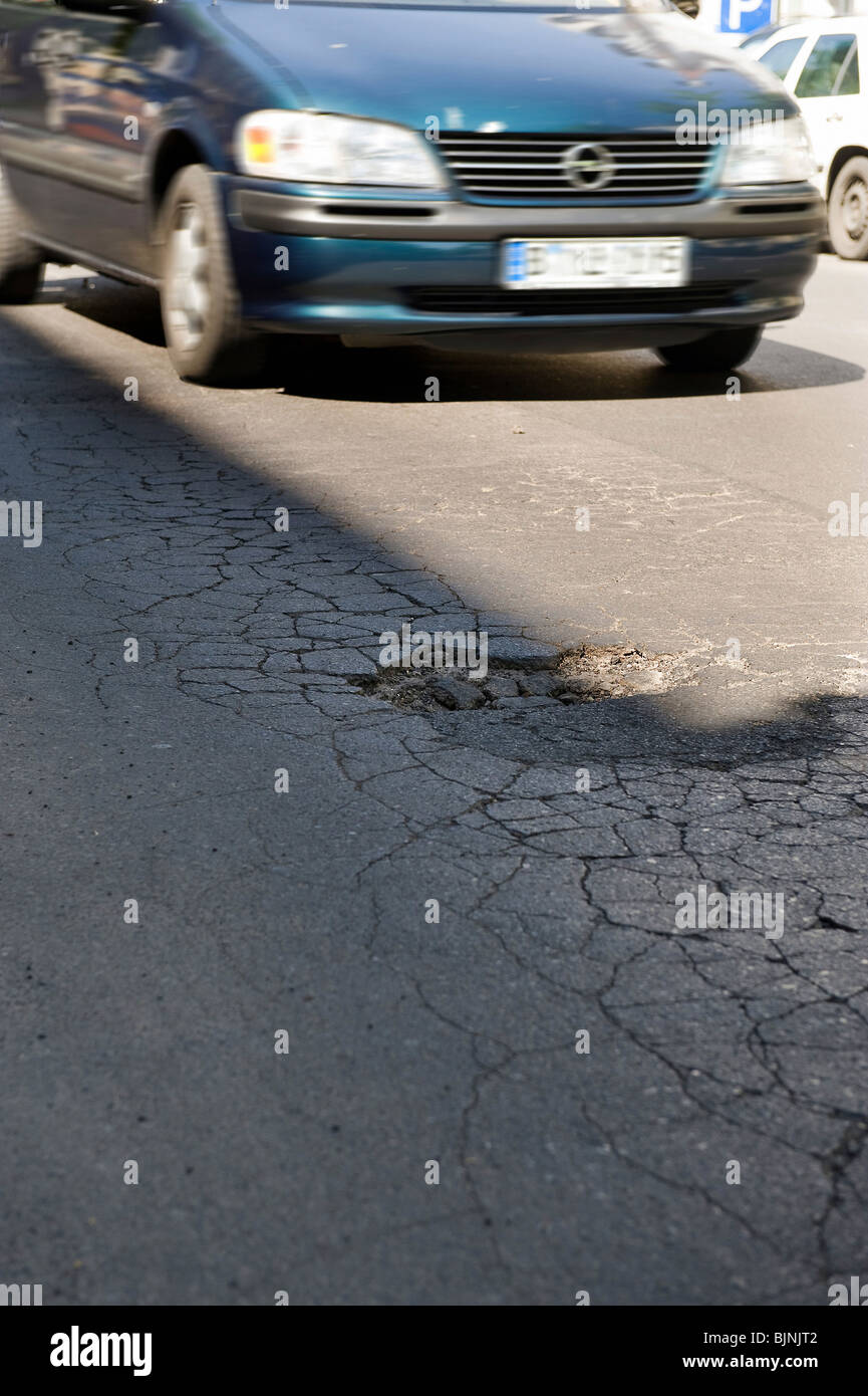 Bad road conditions in Berlin Pankow, Germany Stock Photo Alamy