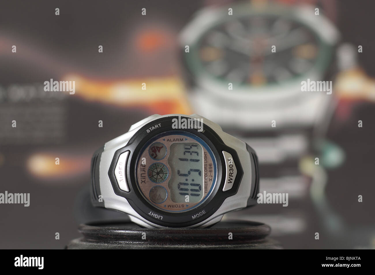 cheap asian plastic digital watch Stock Photo Alamy