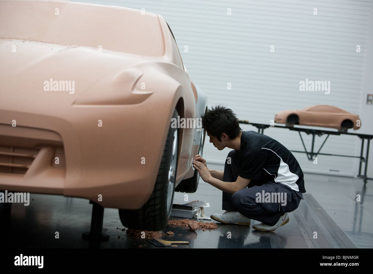 Clay modelers at work on a model of the 'Nissan Fairlady Z' car at the Nissan Design Centre, Atsugi, Japan, 2010. Stock Photo
