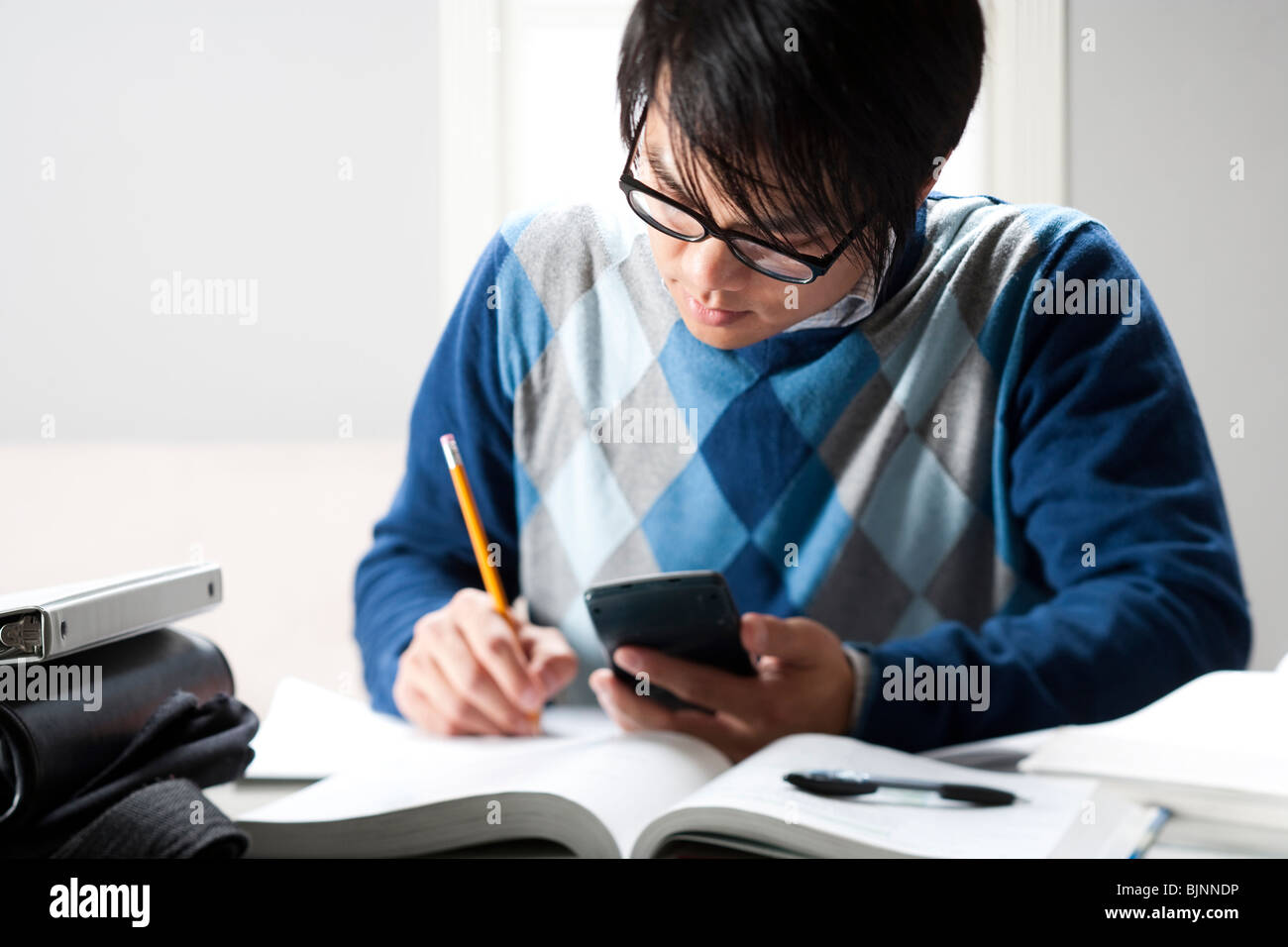 Student concentrating and studying Stock Photo
