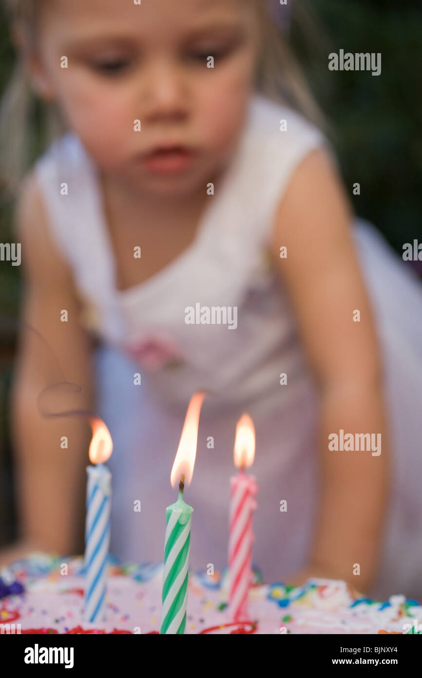 Girl and birthday candles Stock Photo Alamy