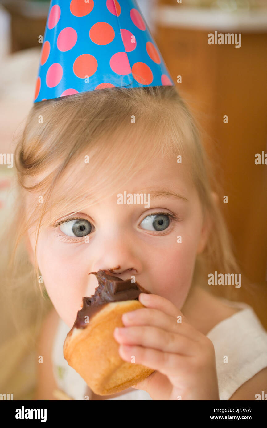 Little girl with a cupcake Stock Photo Alamy