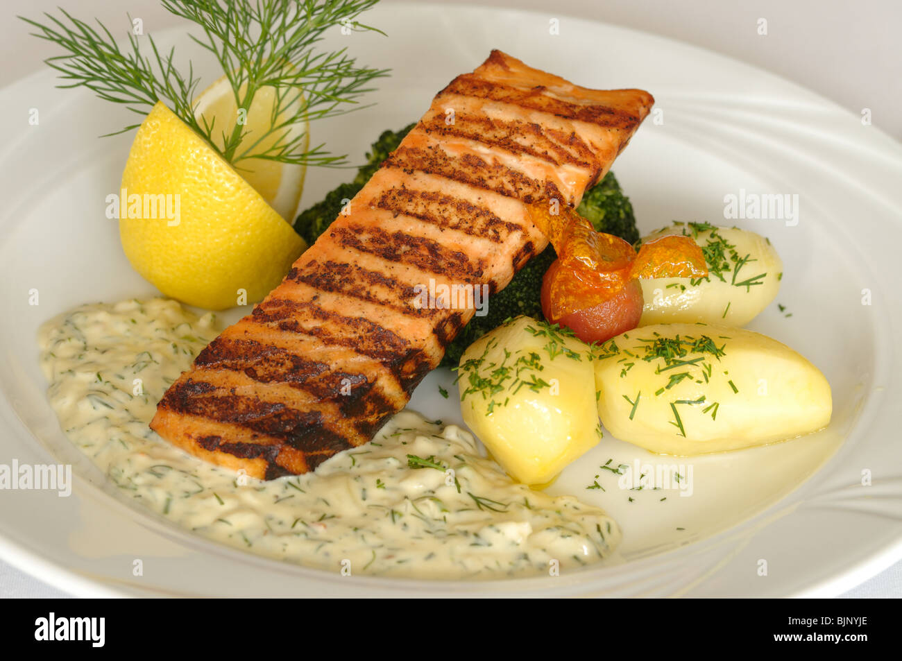 Grilled salmon served in restaurant Stock Photo - Alamy