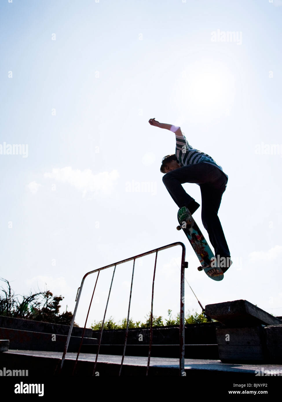 Teenage boy on skateboard Stock Photo