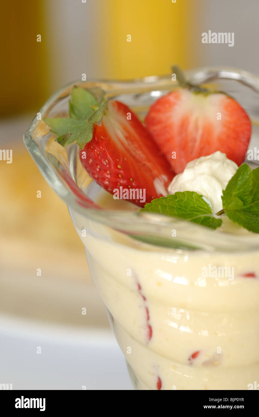 Zabaglione with strawberries served at restaurant Stock Photo Alamy