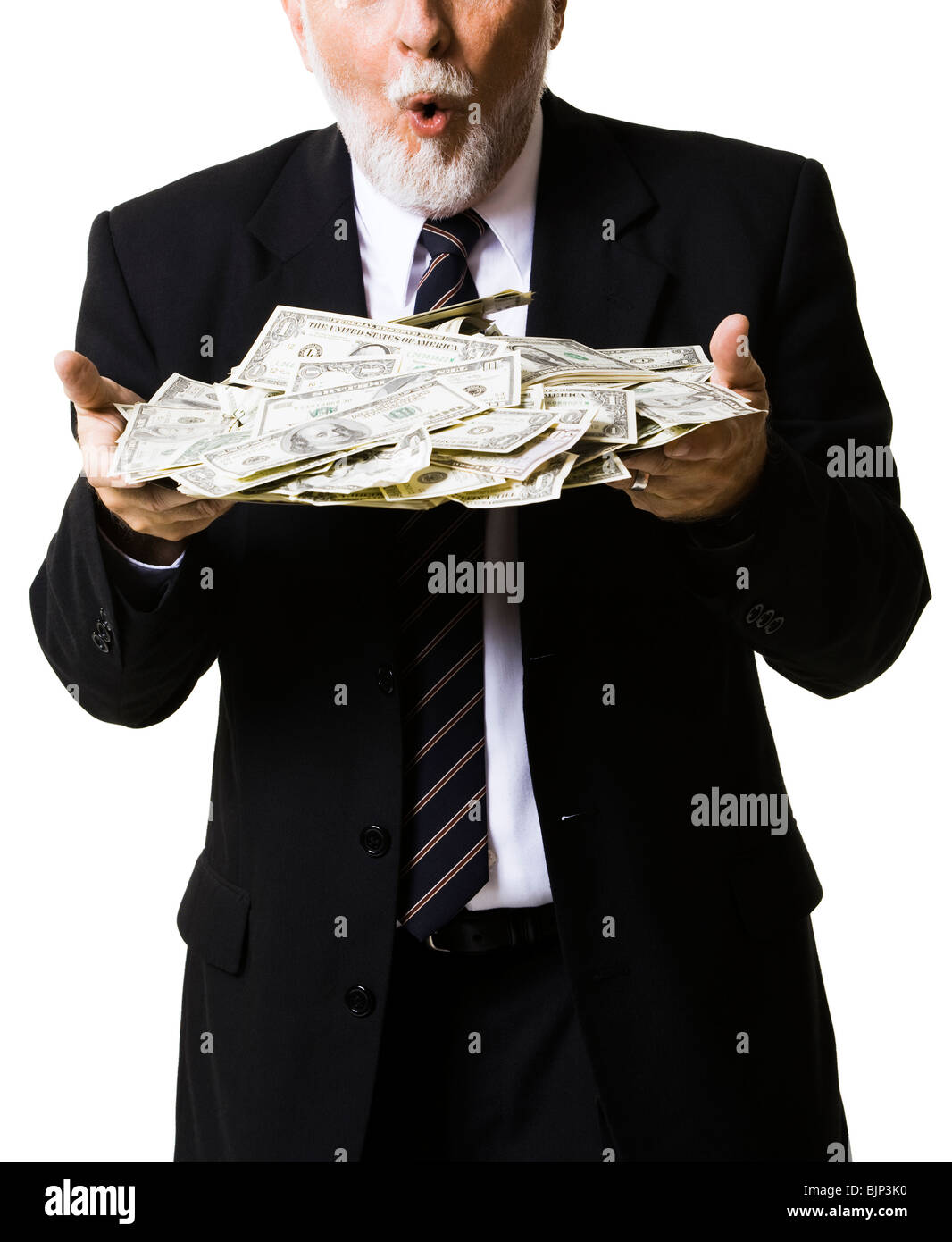 Portrait of businessman holding money bag Stock Photo - Alamy