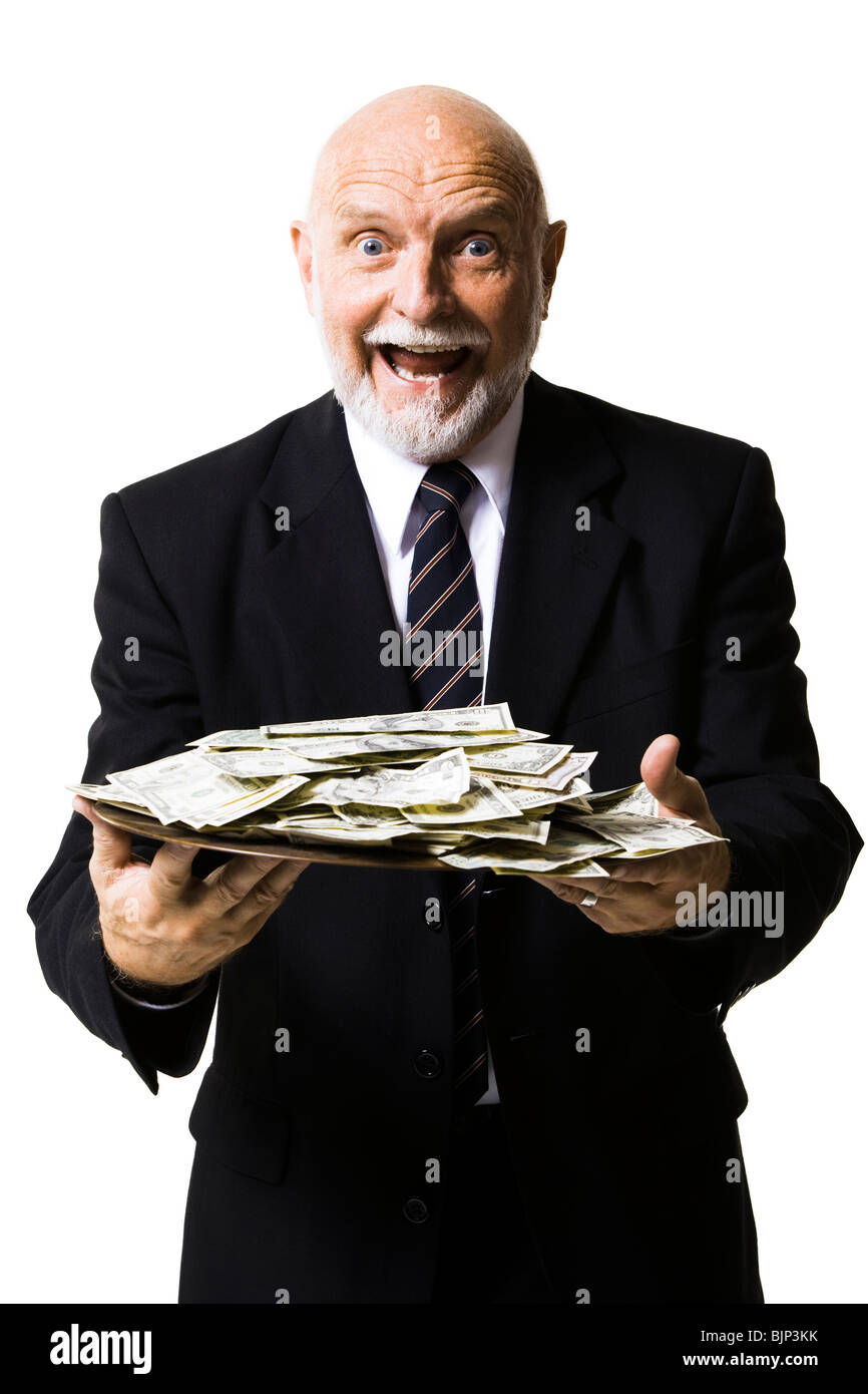 Portrait of businessman holding money bag Stock Photo - Alamy