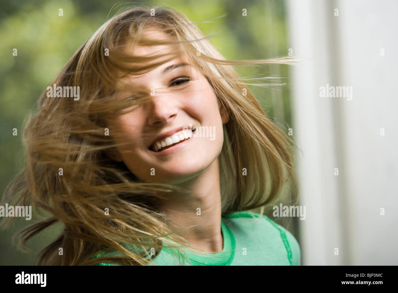 Woman swinging head hi-res stock photography and images - Alamy
