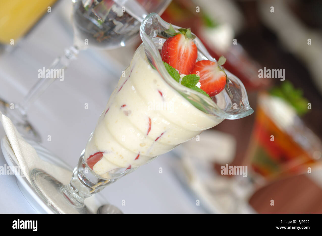 Zabaglione with strawberries served at restaurant Stock Photo Alamy