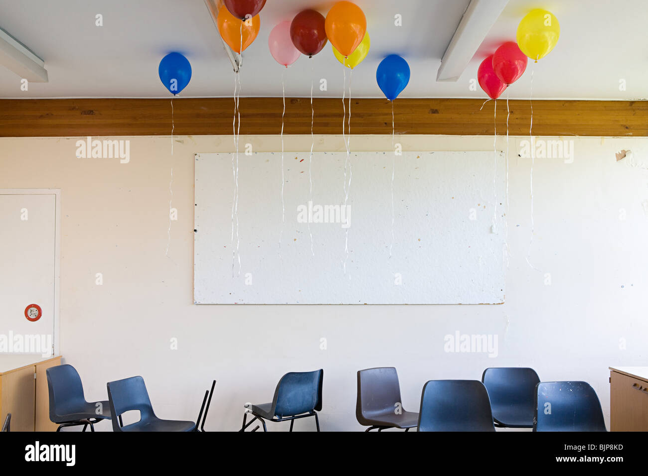 Balloons in classroom Stock Photo Alamy