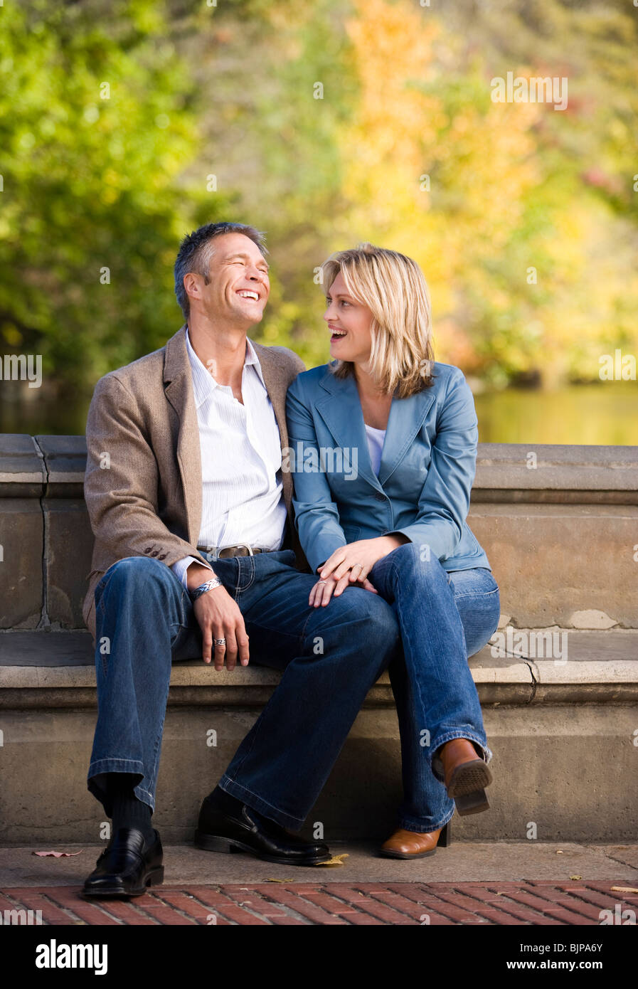 Man and woman talking Stock Photo - Alamy