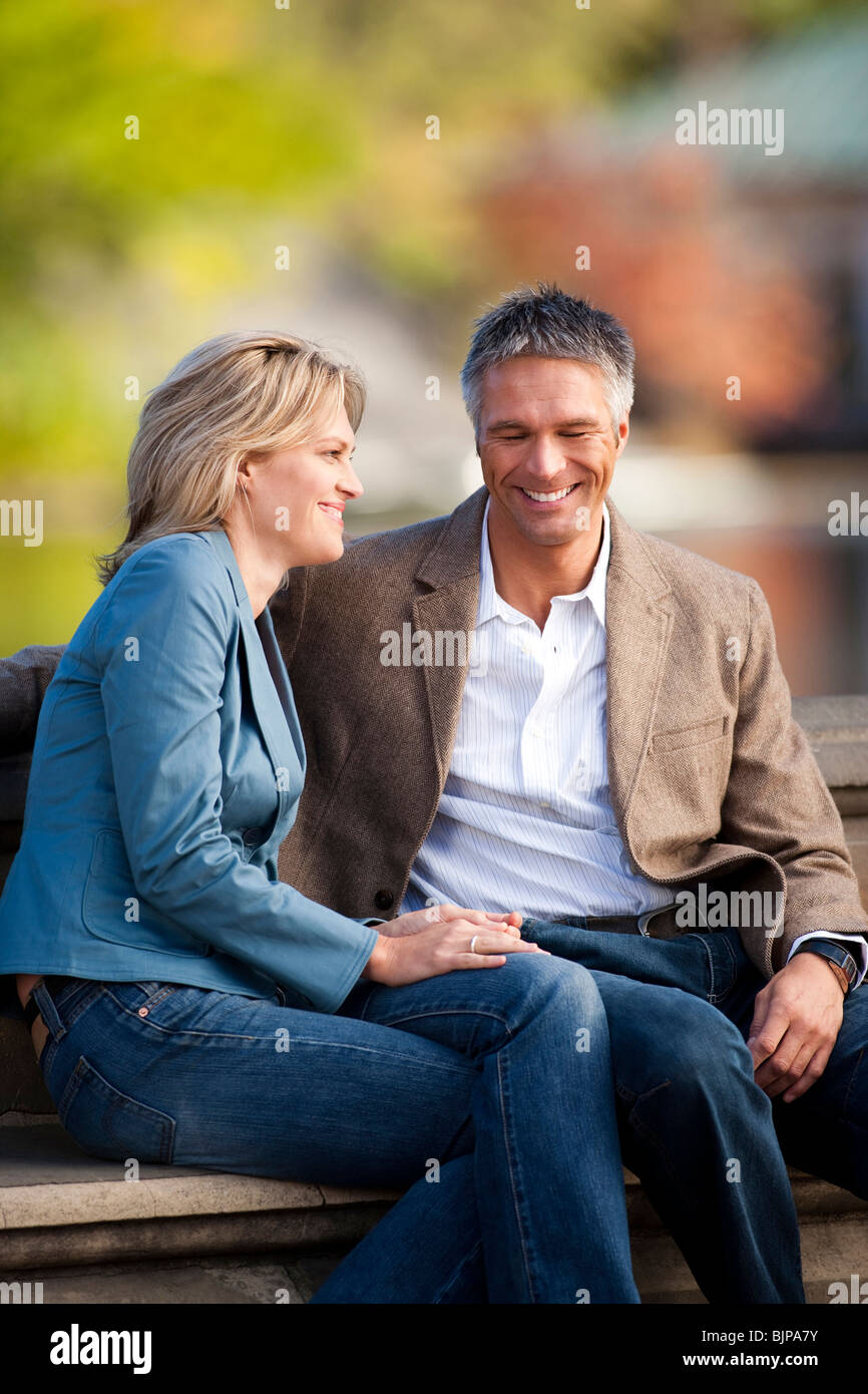 Man and woman talking Stock Photo - Alamy