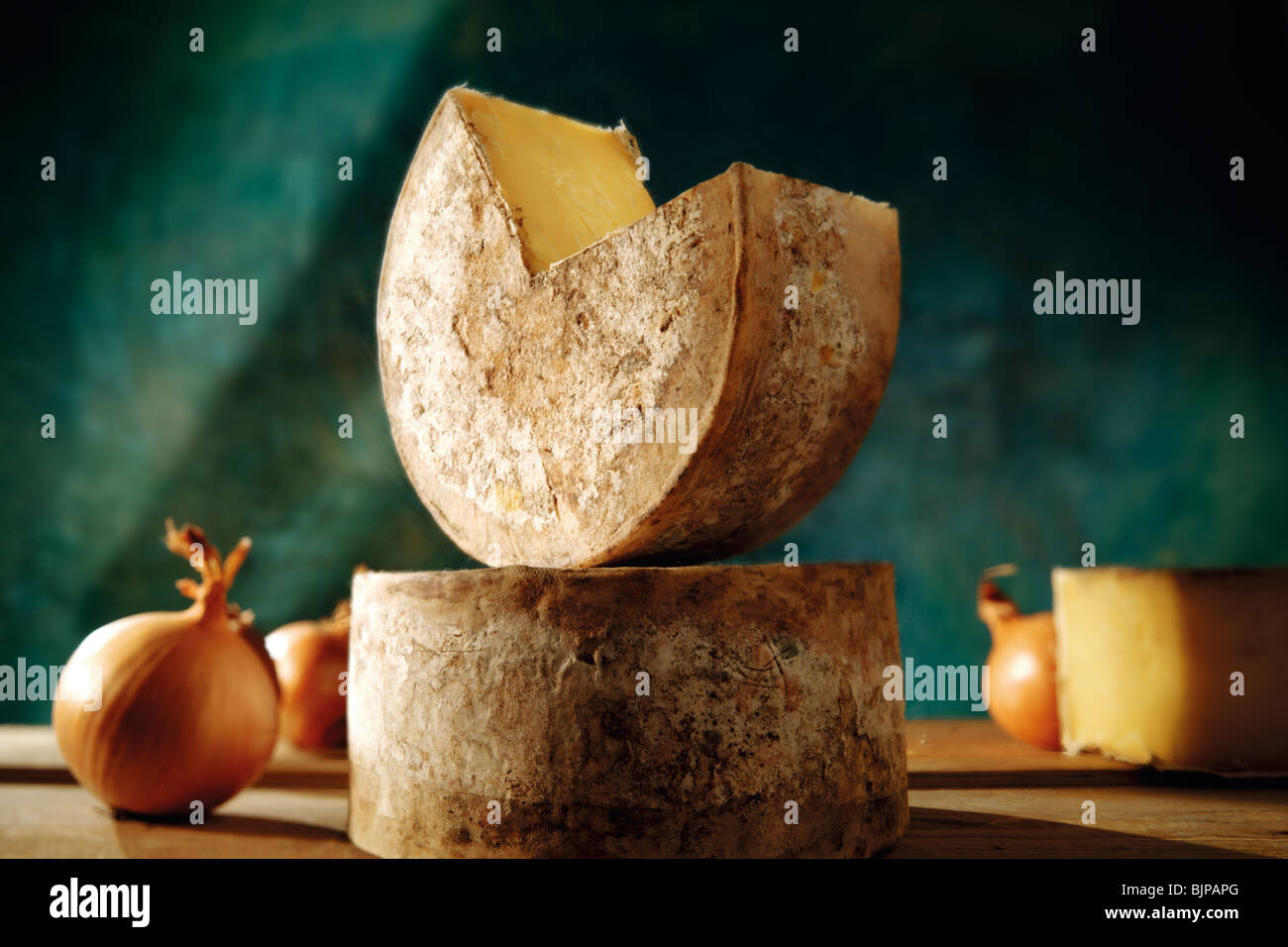 whole cut cloth bound round truckle of English farmhouse cheddar cheese ...