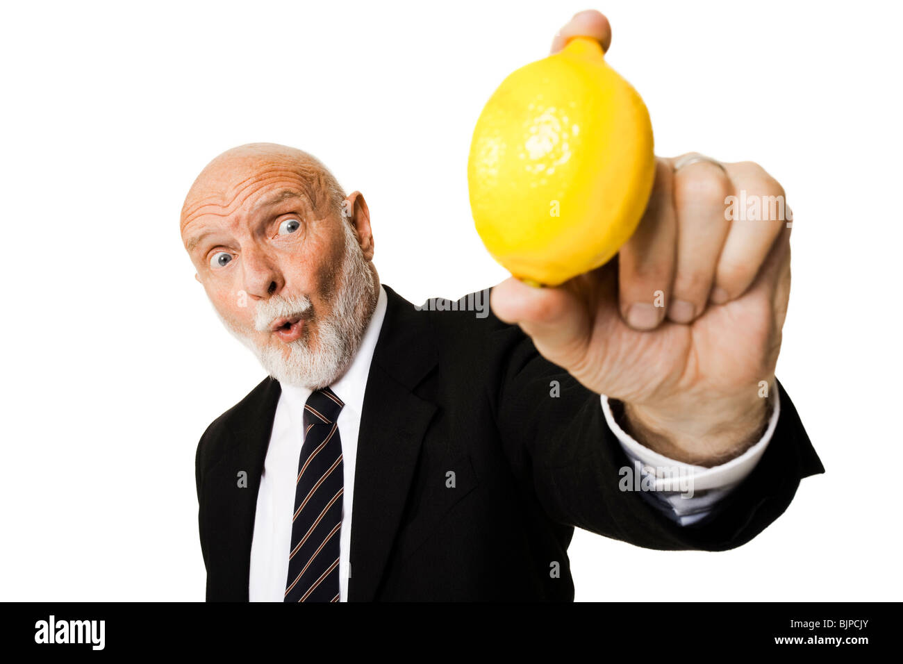 Barman pelando un limon Stock Photo