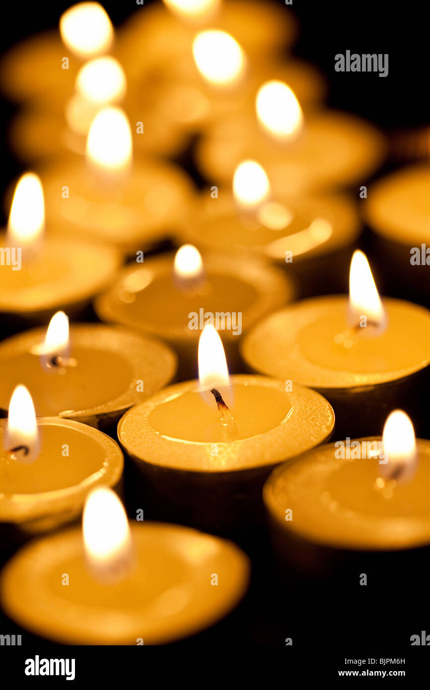 photo shot of burning tea candles Stock Photo Alamy