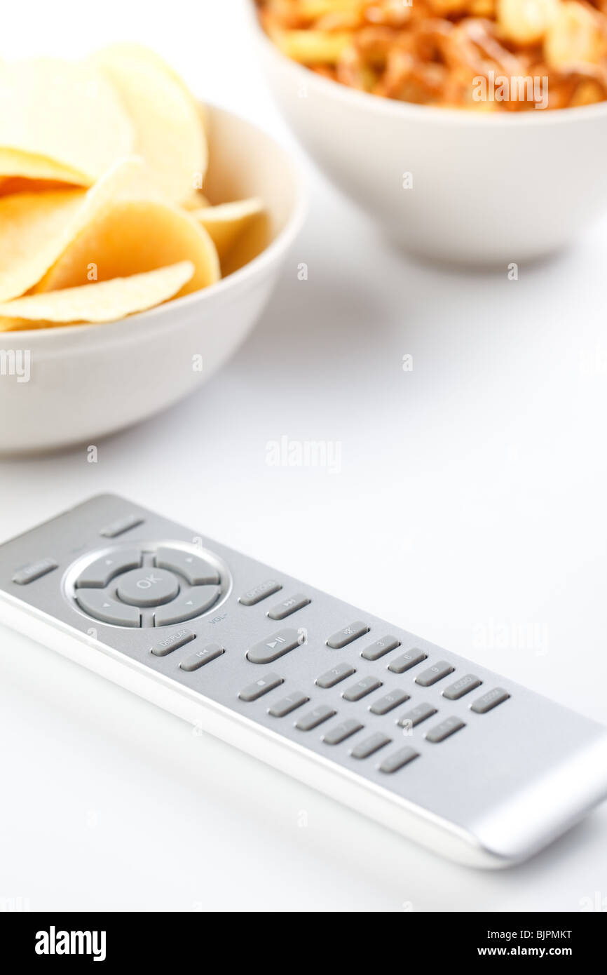 remote control and chips Stock Photo