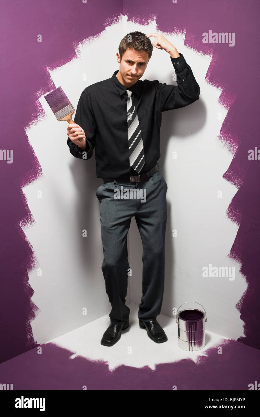 Person standing alone in corner hires stock photography and images Alamy