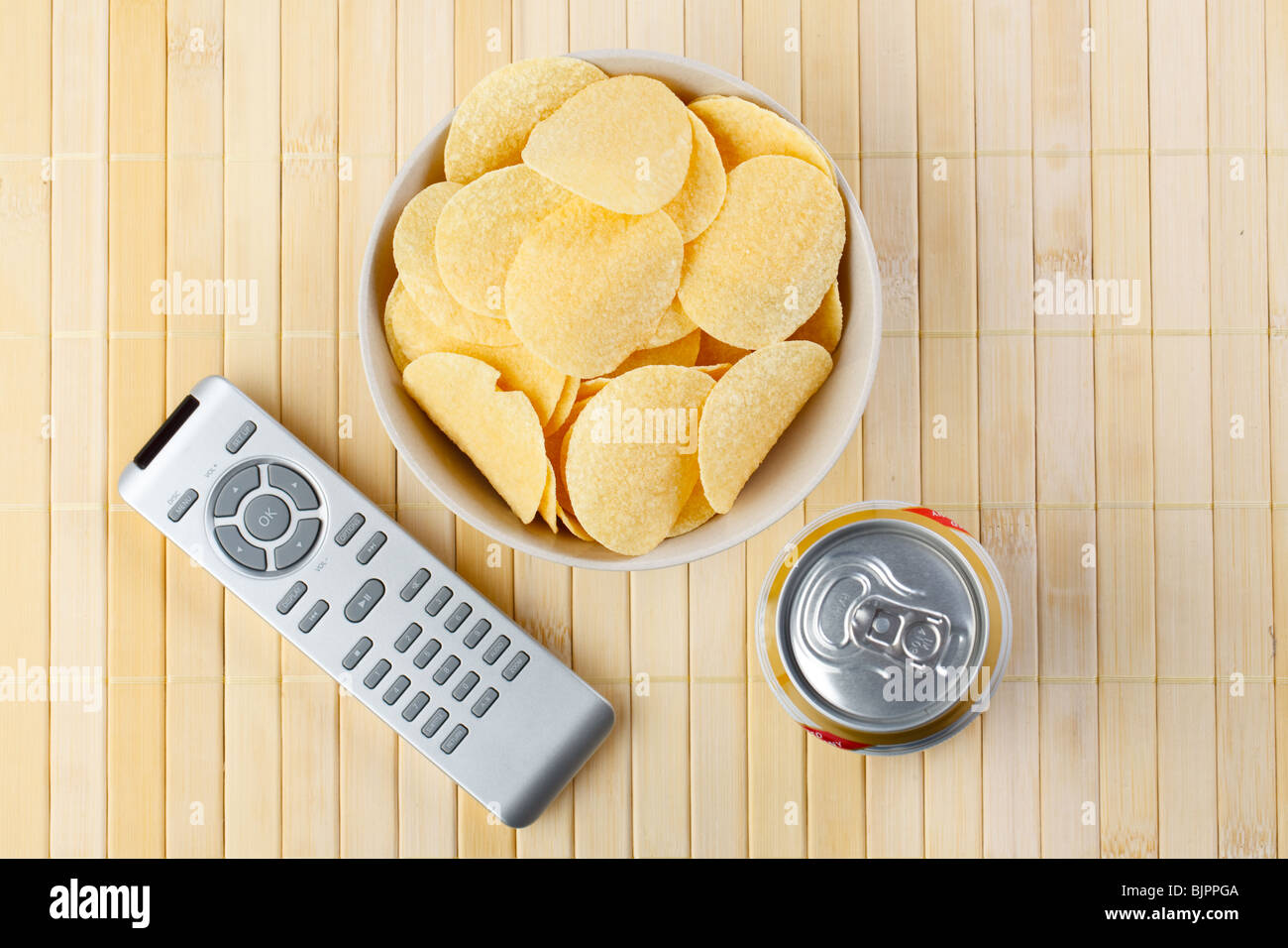 remote control and chips Stock Photo