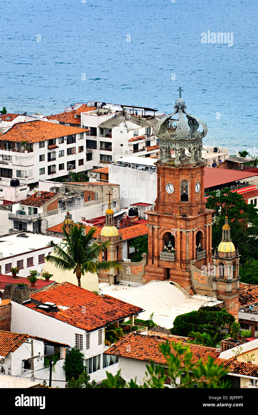 Cityscape view from above with church and Pacific ocean in Puerto Vallarta, Mexico Stock Photo