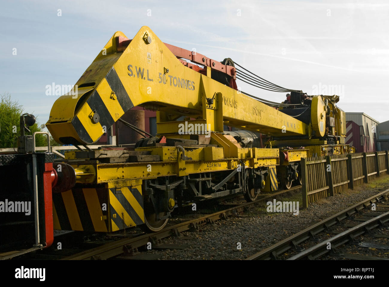 Cowans Sheldon 50 tonne strut jib rail crane at Crewe, Cheshire, UK.  With jib stowed. Stock Photo