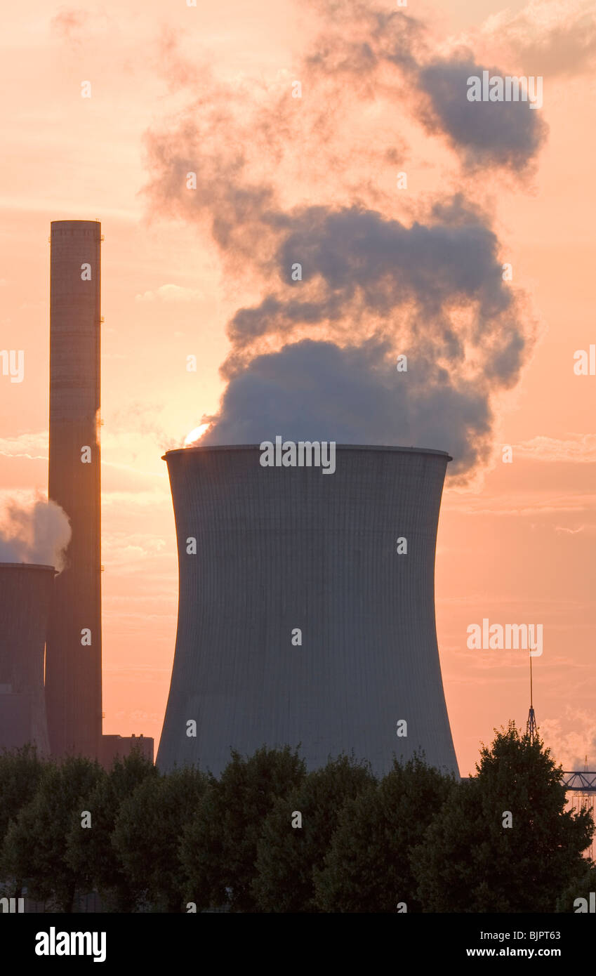 smoky power plant in a sundown Stock Photo