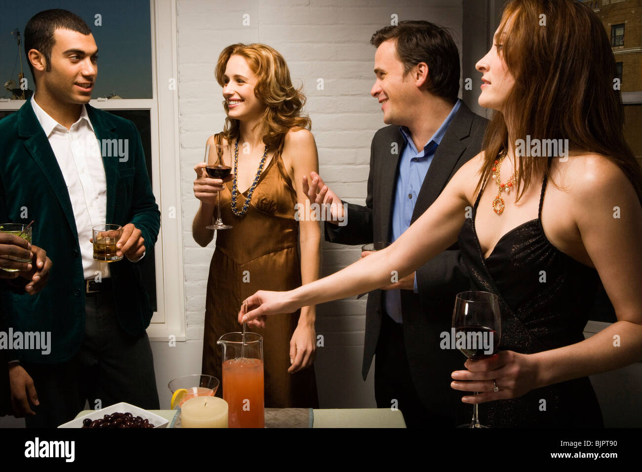 Partygoers toasting Stock Photo