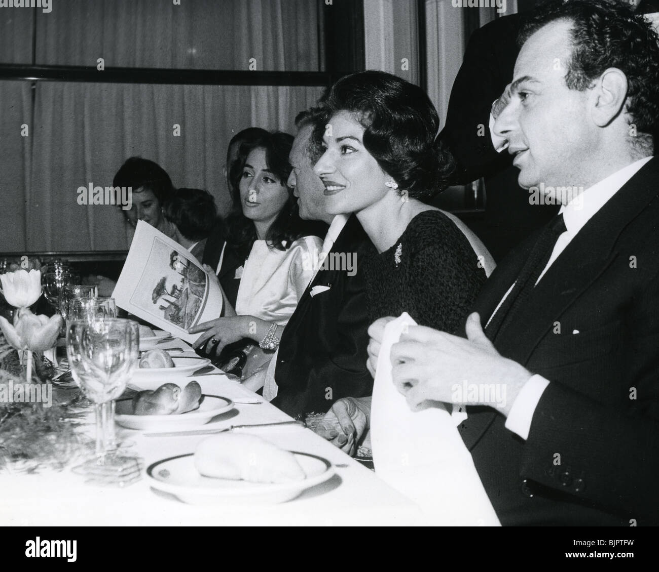 MARIA CALLAS with Van Heflin to her left in Milan in 1961 after the premiere of the film Il Relitto (The Wastrel) Stock Photo