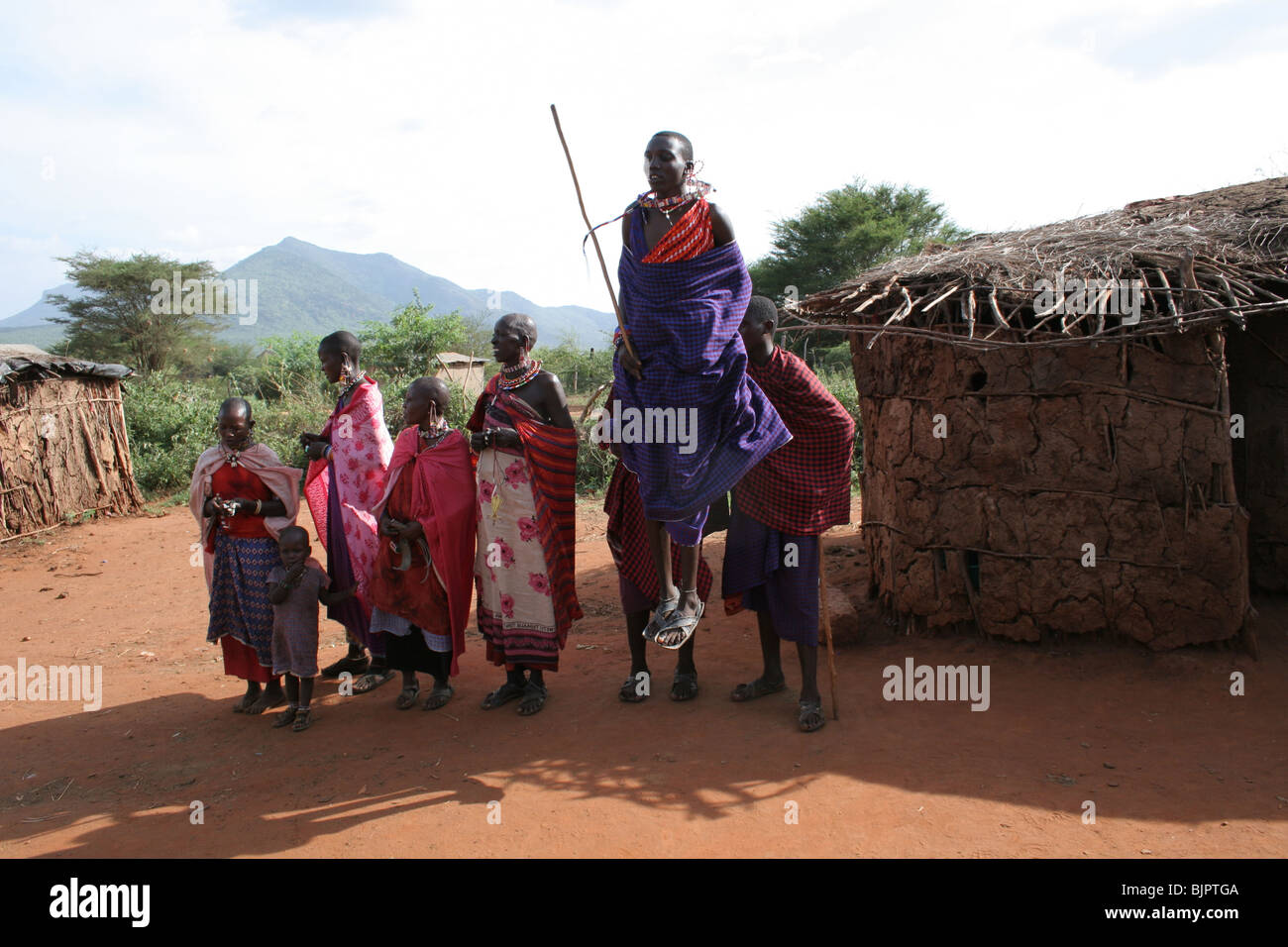 Maasai doing the traditional dance Adumu at Tsavo national park Kenya Stock Photo