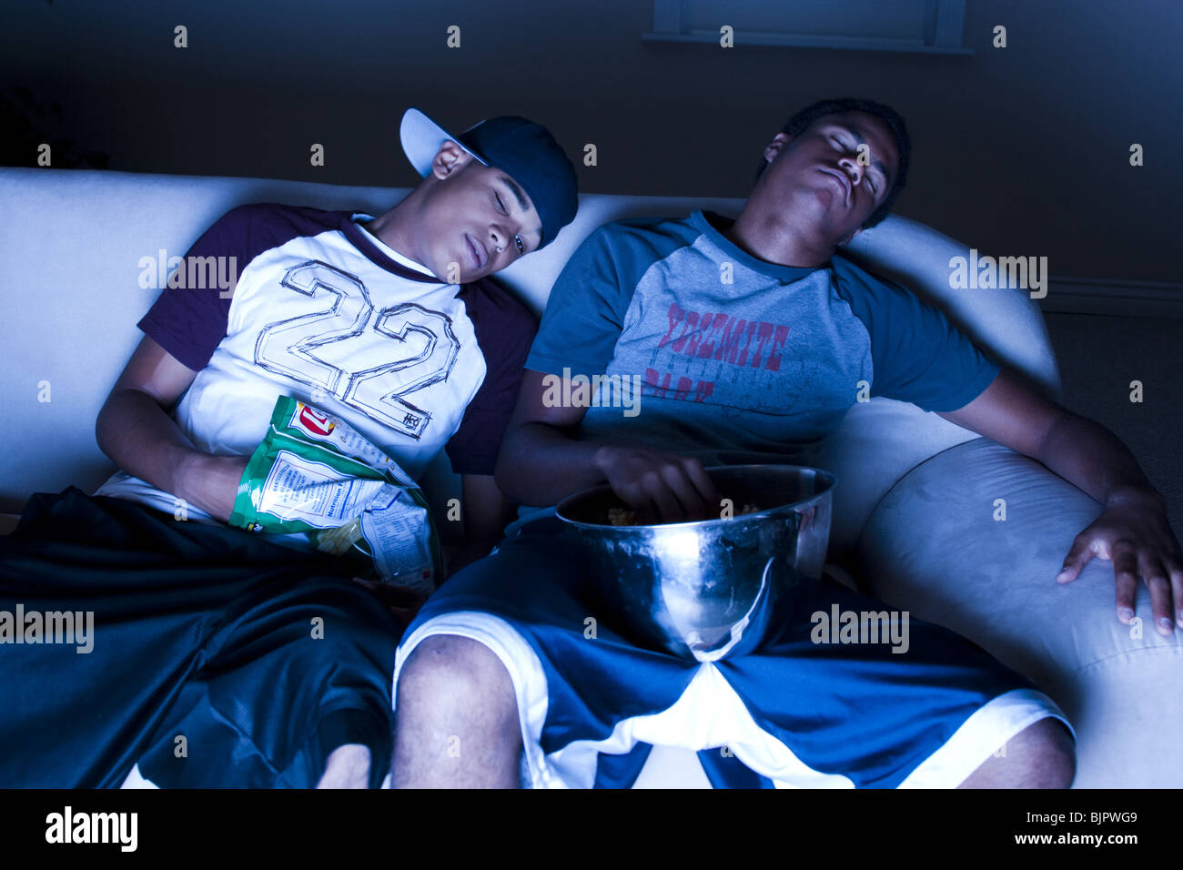 Friends sleeping on lounge chairs hires stock photography and images