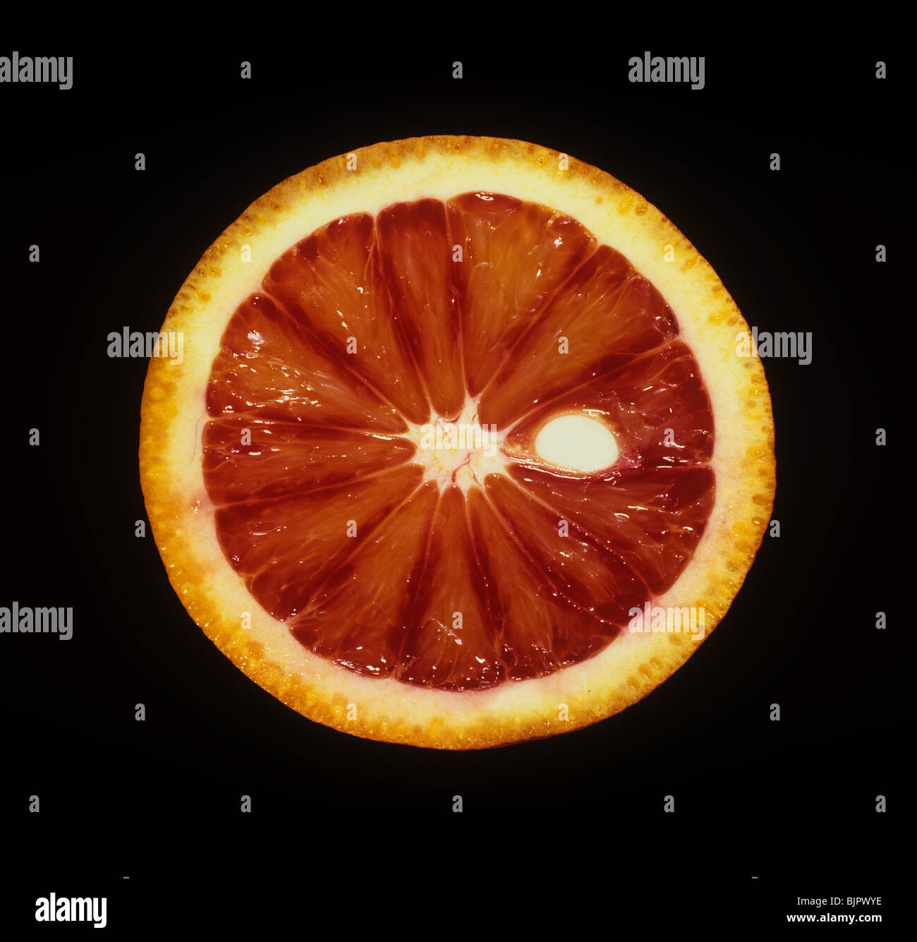 Sectioned blood orange fruit variety Sanguinelli, origin Spain Stock