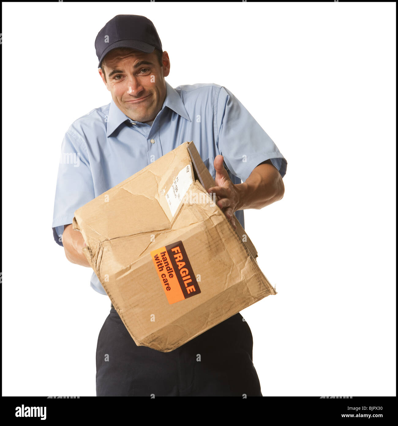 Delivery man with damaged package Stock Photo Alamy