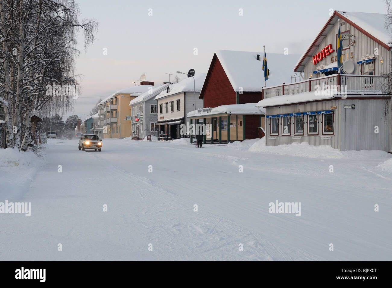 The center of th town Jokkmokk. You can see a hotel and a cinema, both in the old-fashioned style. Stock Photo