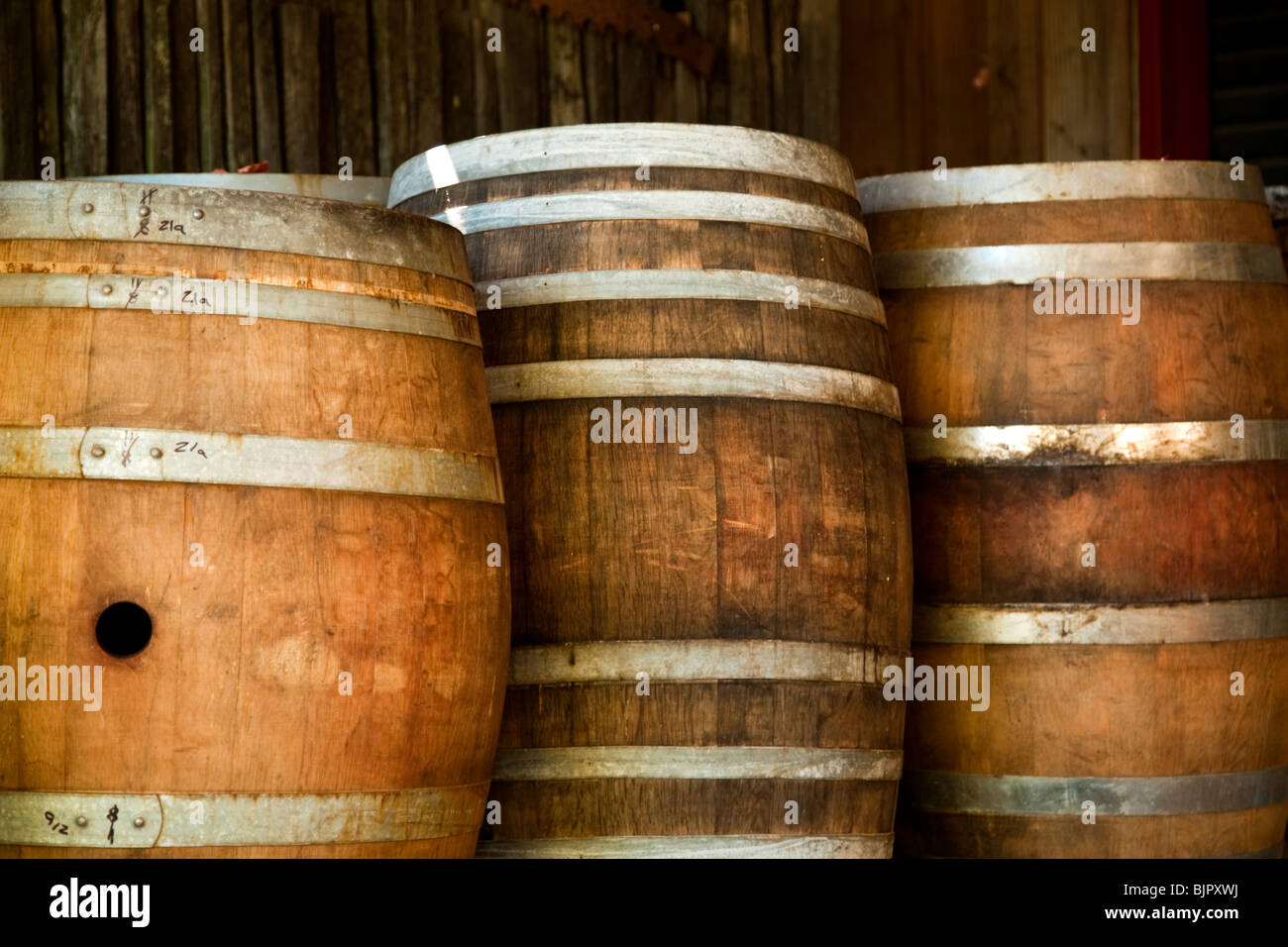 Wine casks in cellar at winery, Hawke's Bay, New Zealand Stock Photo