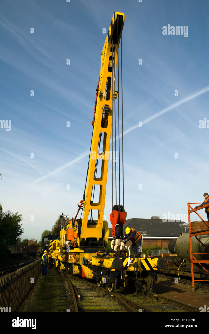 Cowans Sheldon 50 tonne strut jib rail crane at Crewe, Cheshire, UK.  Preparing to lift the relieving bogey. Stock Photo