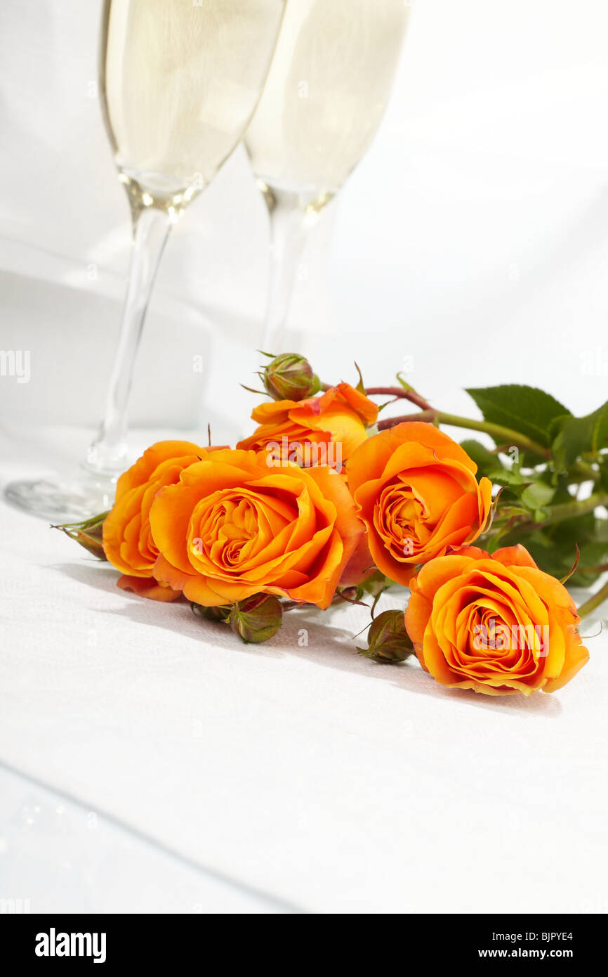 Roses and glasses of champagne Stock Photo