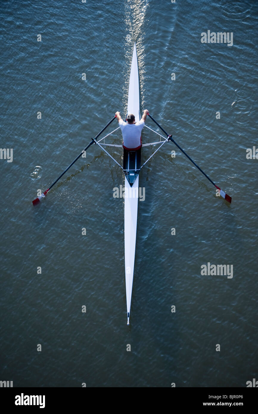 Man rowing in Florence Italy Stock Photo