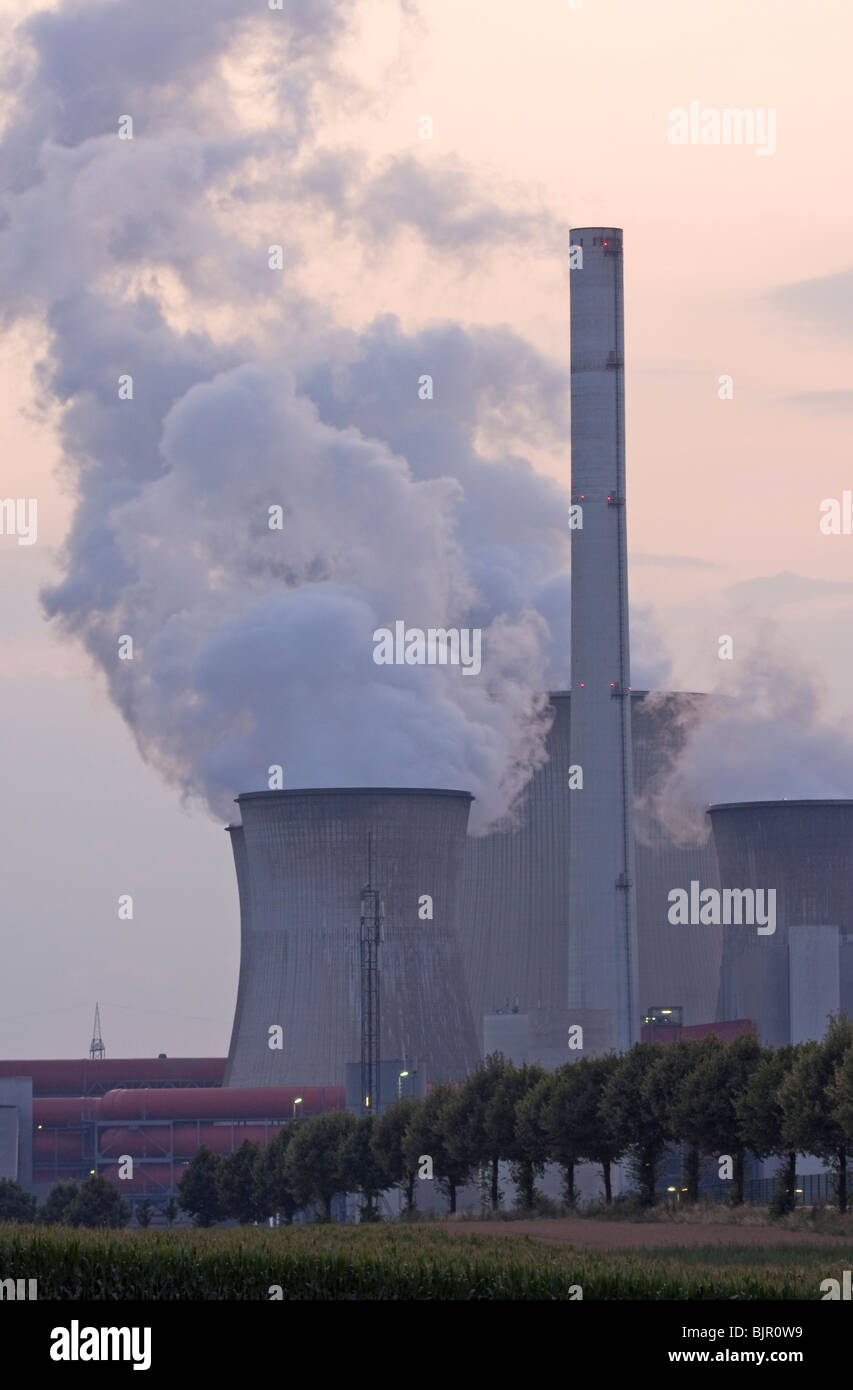 smoky power plant at sundown Stock Photo