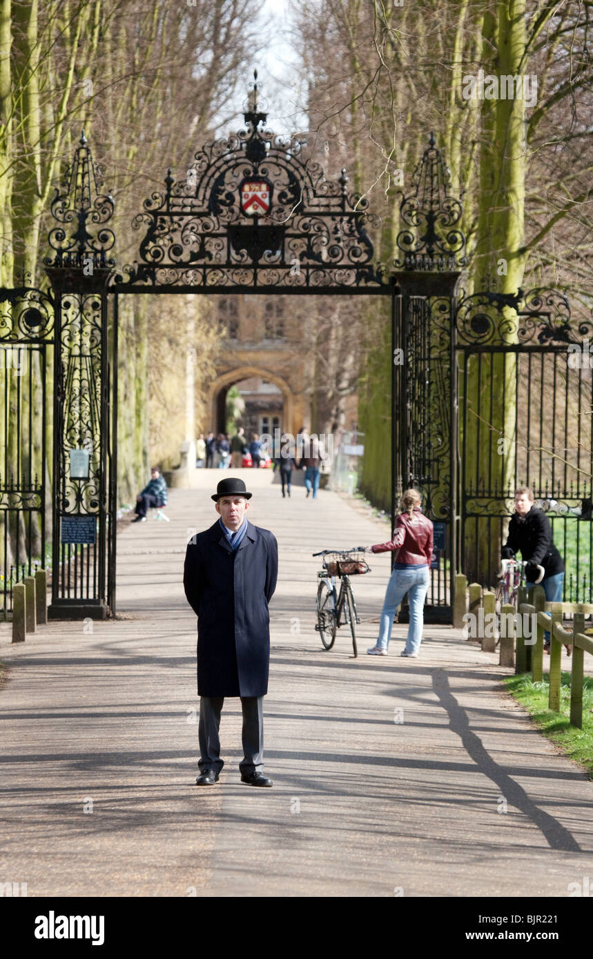 A University porter at the back entrance to Trinity College, Cambridge University, UK Stock Photo