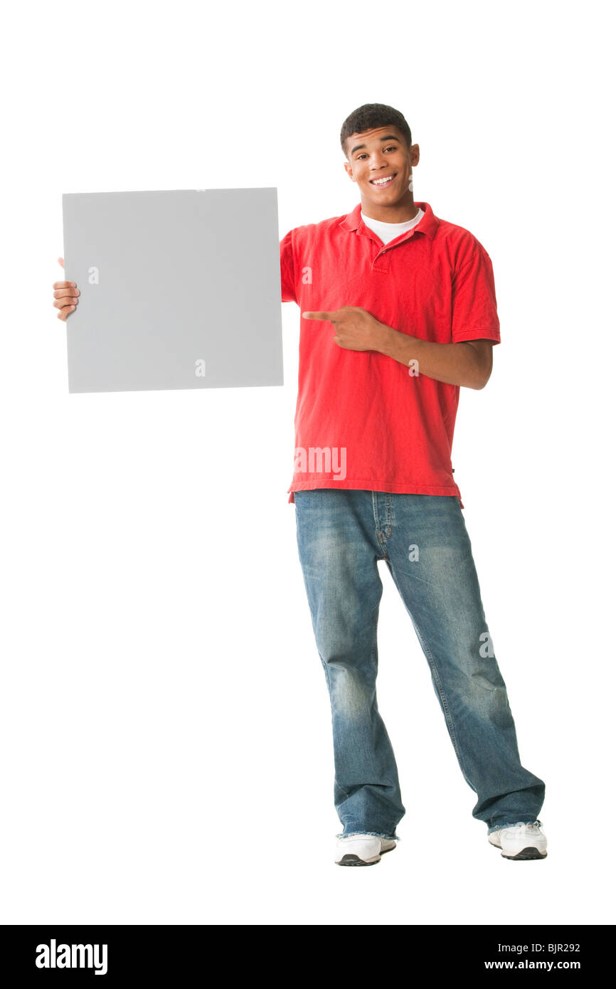 Teenage boy with blank sign Stock Photo - Alamy