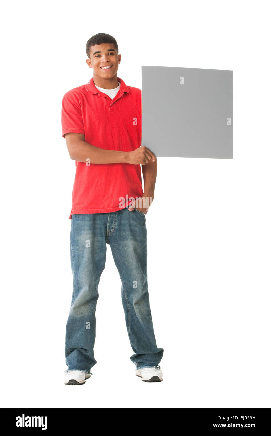Teenage boy with blank sign Stock Photo - Alamy