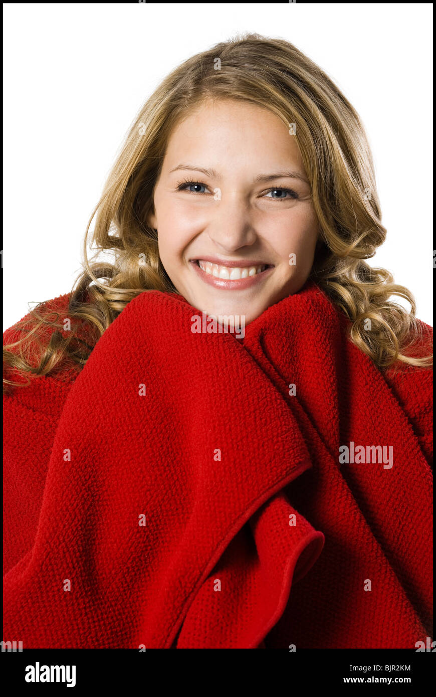 young woman wrapped in a blanket Stock Photo - Alamy