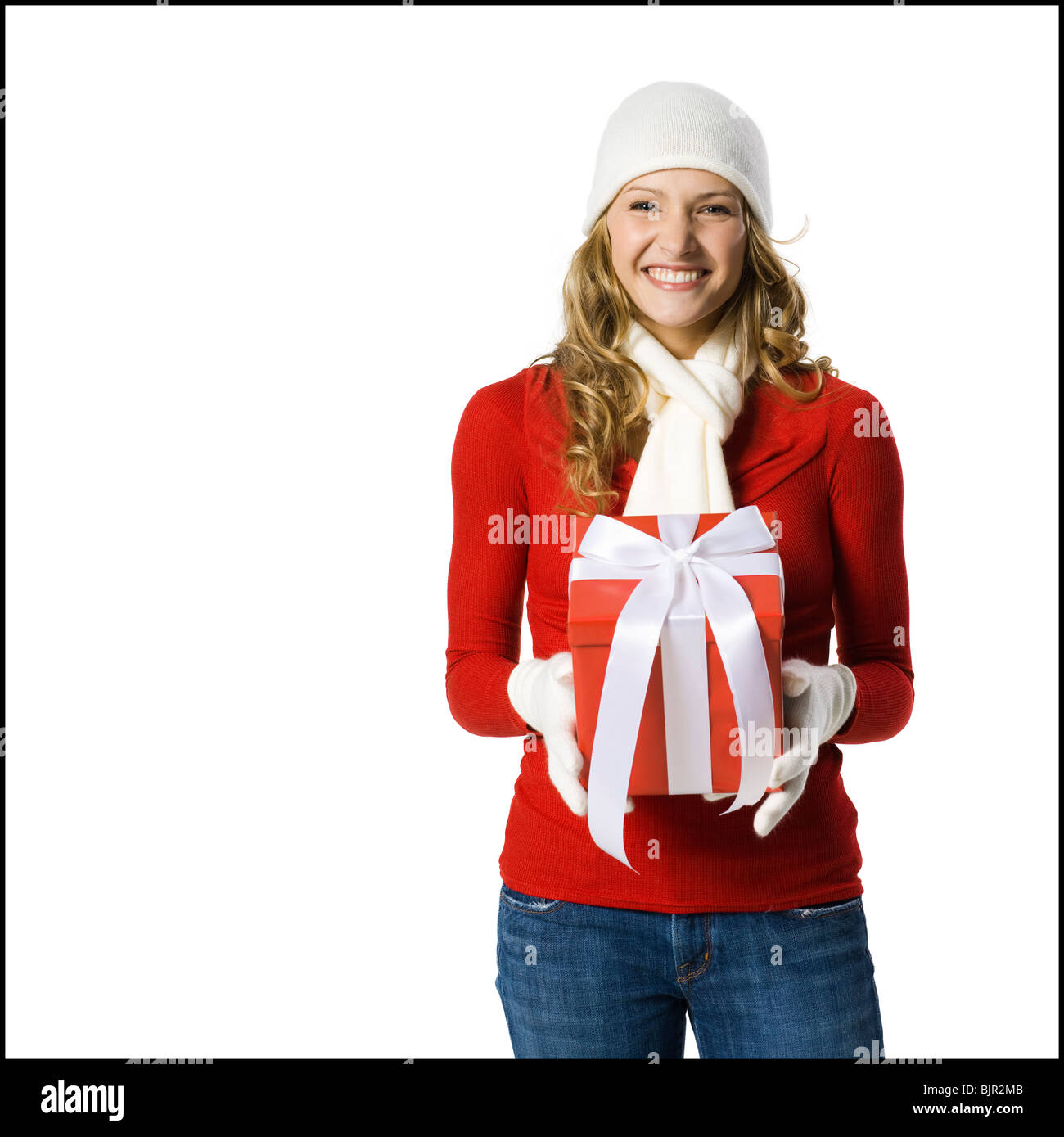 young woman holding a gift Stock Photo - Alamy
