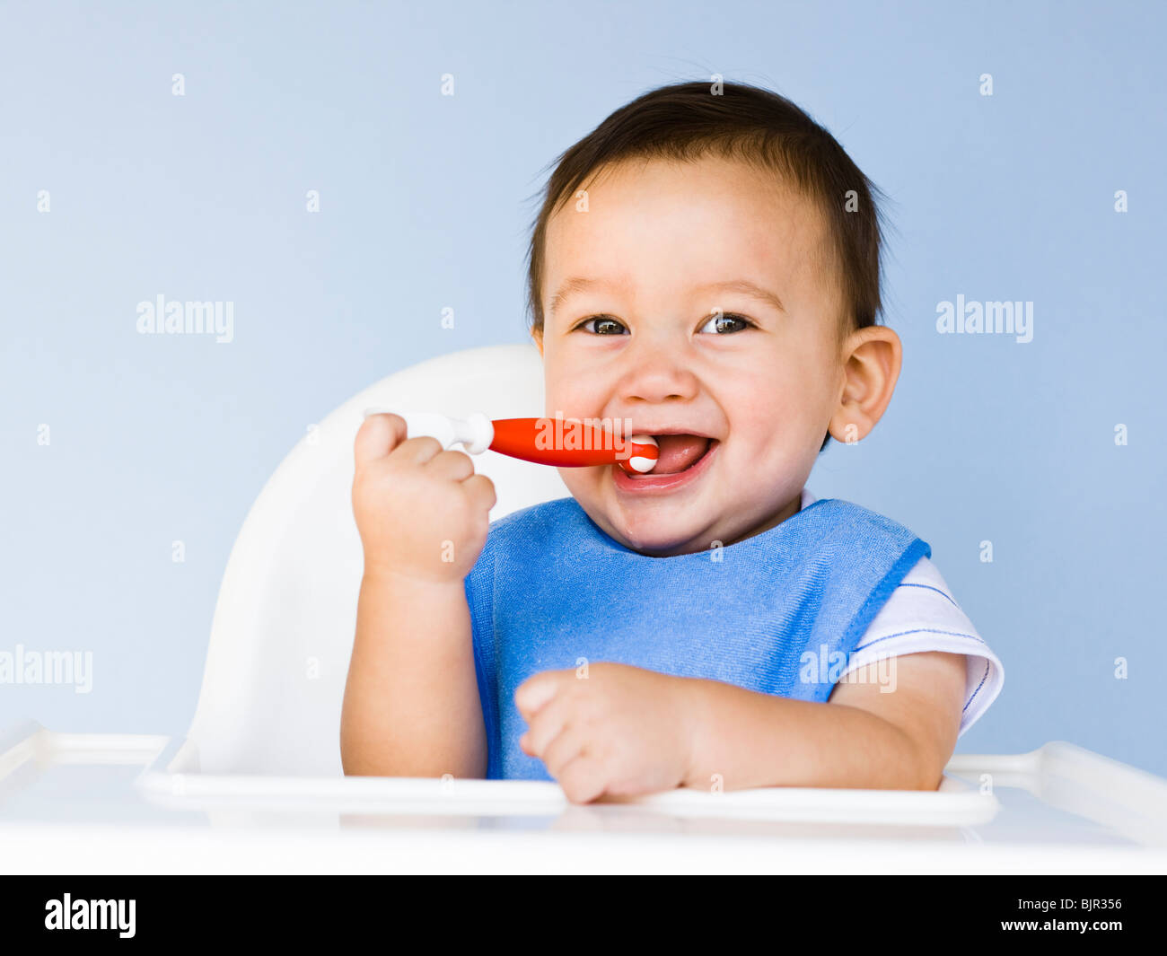 Skin and Light Blue Bib For Babies