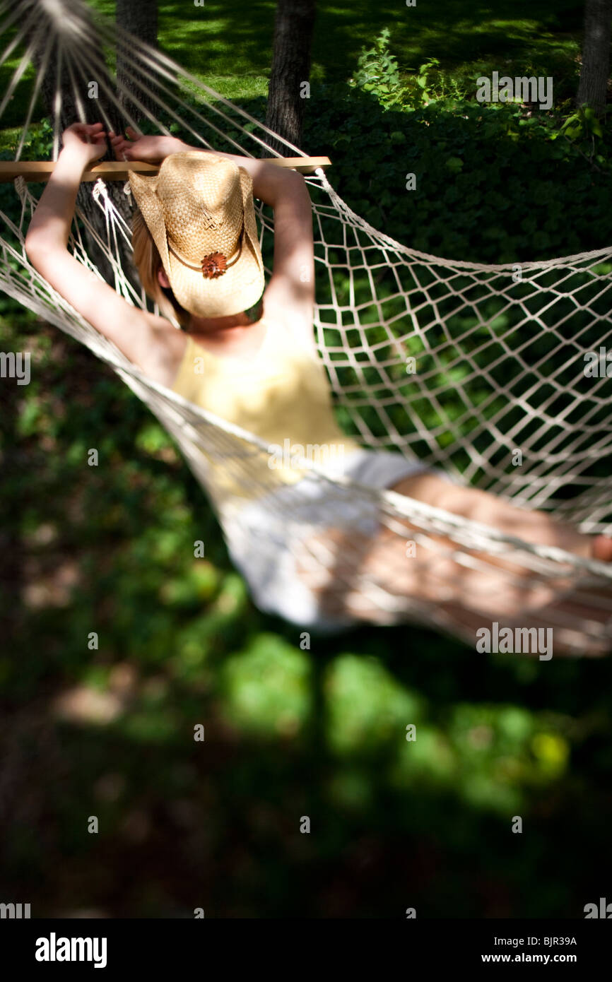 Woman sleeping in a hammock Stock Photo
