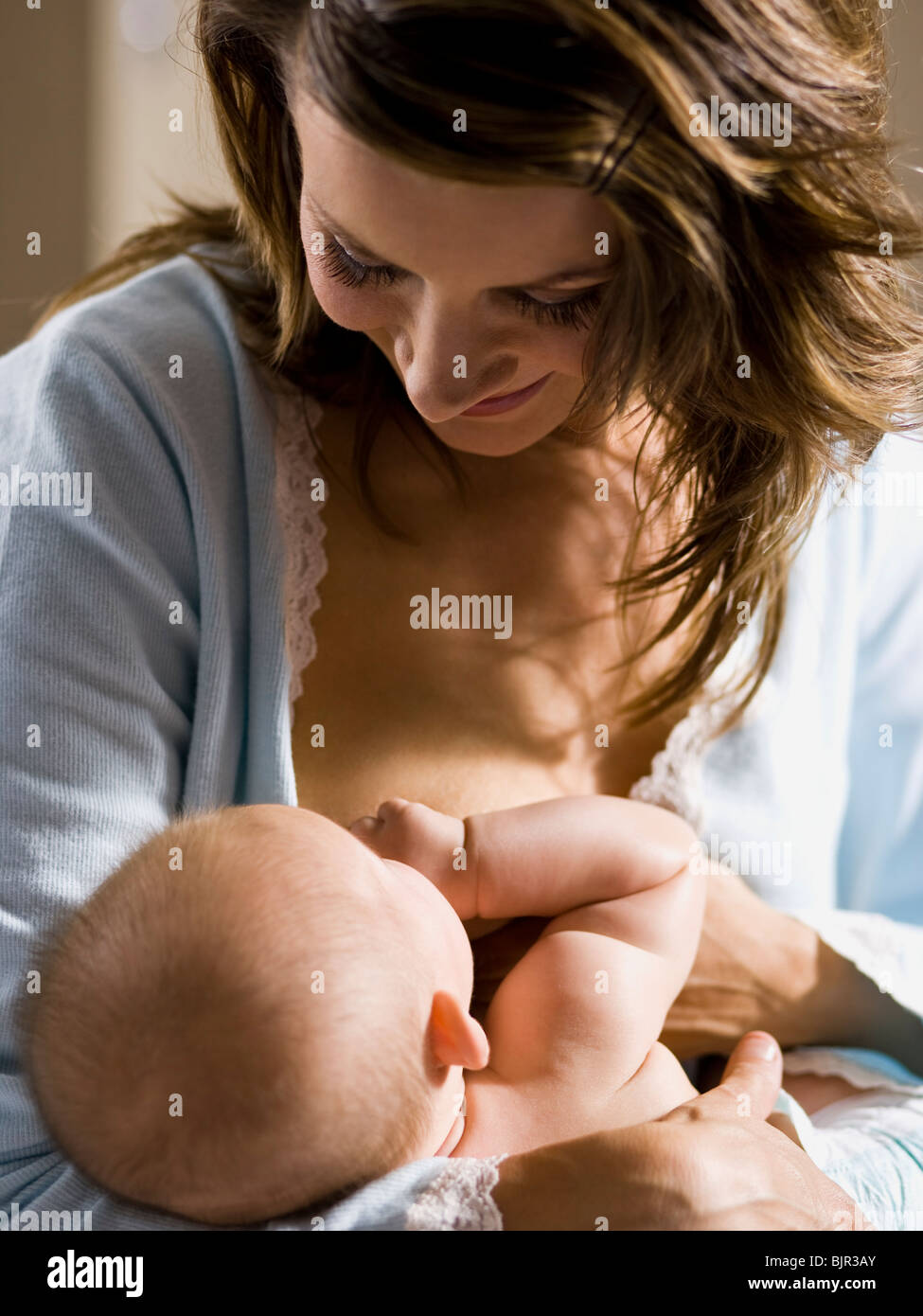 woman nursing her baby. Stock Photo