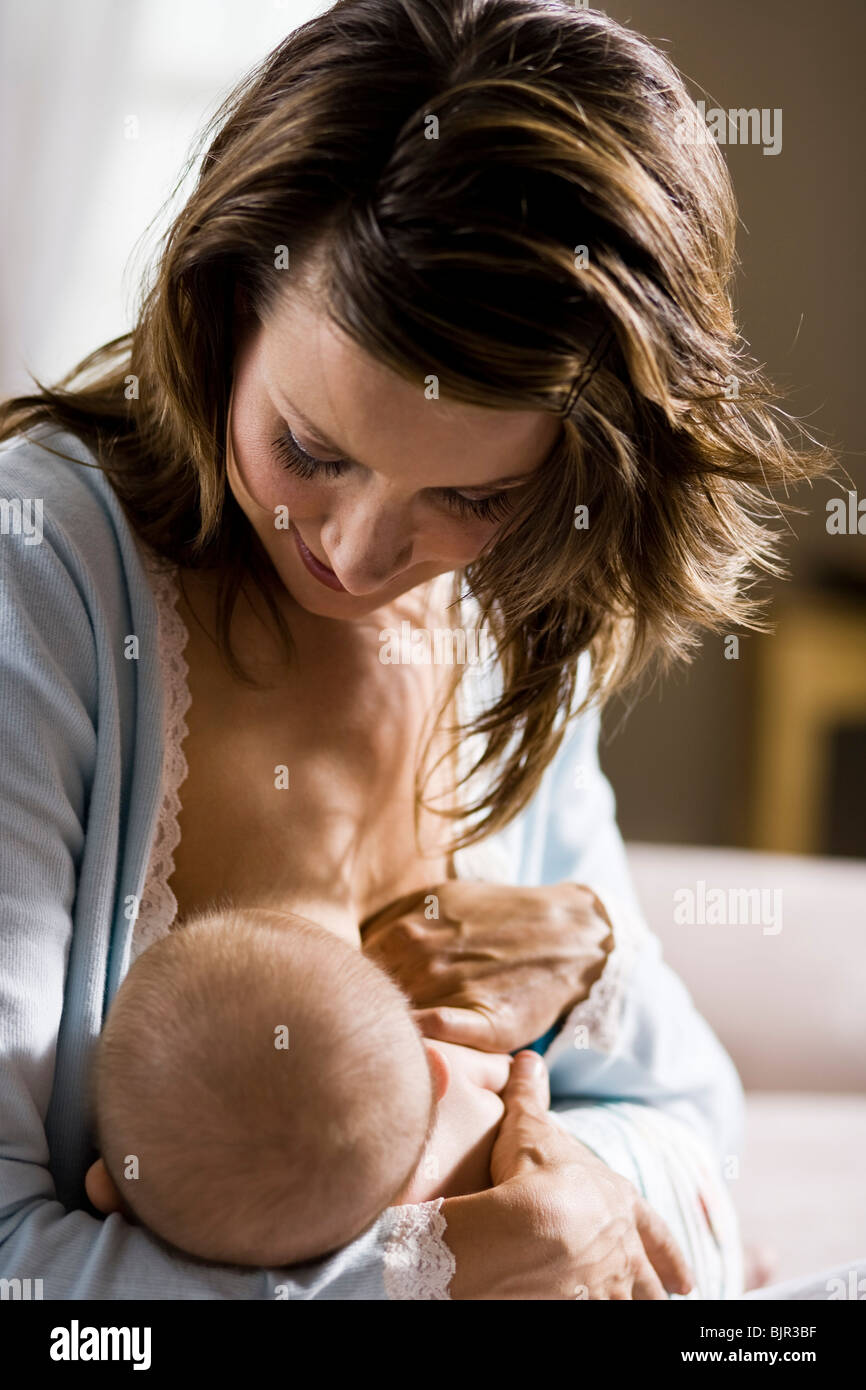 woman nursing her baby. Stock Photo
