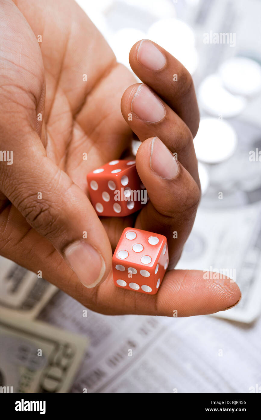 Hand rolling die dice hires stock photography and images Alamy